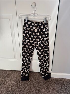 Tea Collection Black Joggers with Cream Bow Print